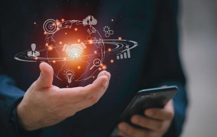a person holding a phone with AI elements